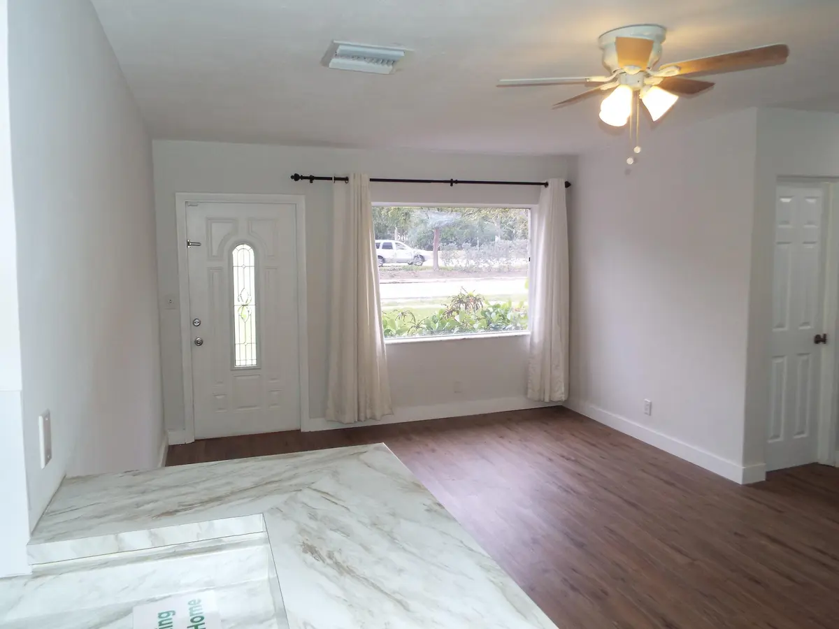 Living rm looking outside at 540 NE 61 Court, Oakland Park