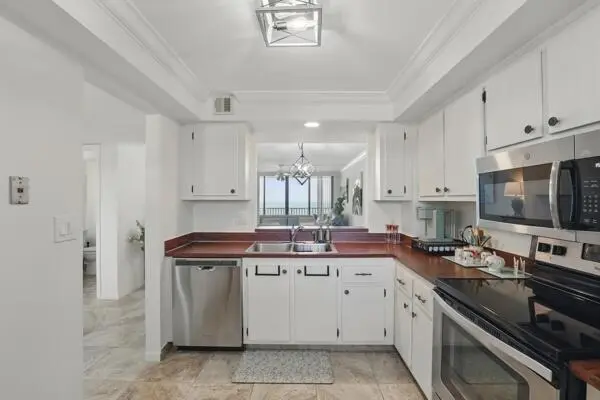 Kitchen into living at 3200 N Highway A1a 1208, Fort Pierce