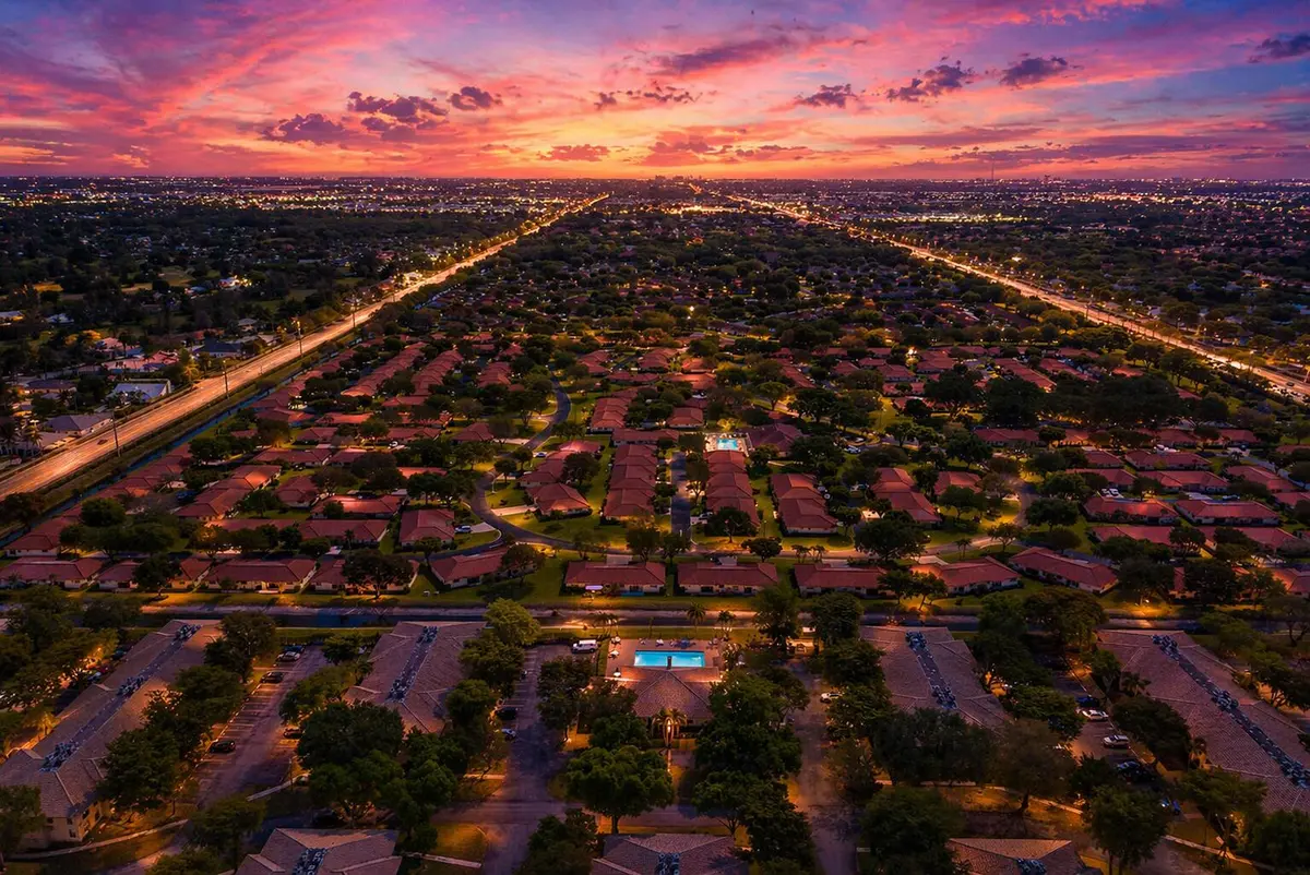 The community at night at 9960 Pineapple Tree Drive 109, Boynton Beach
