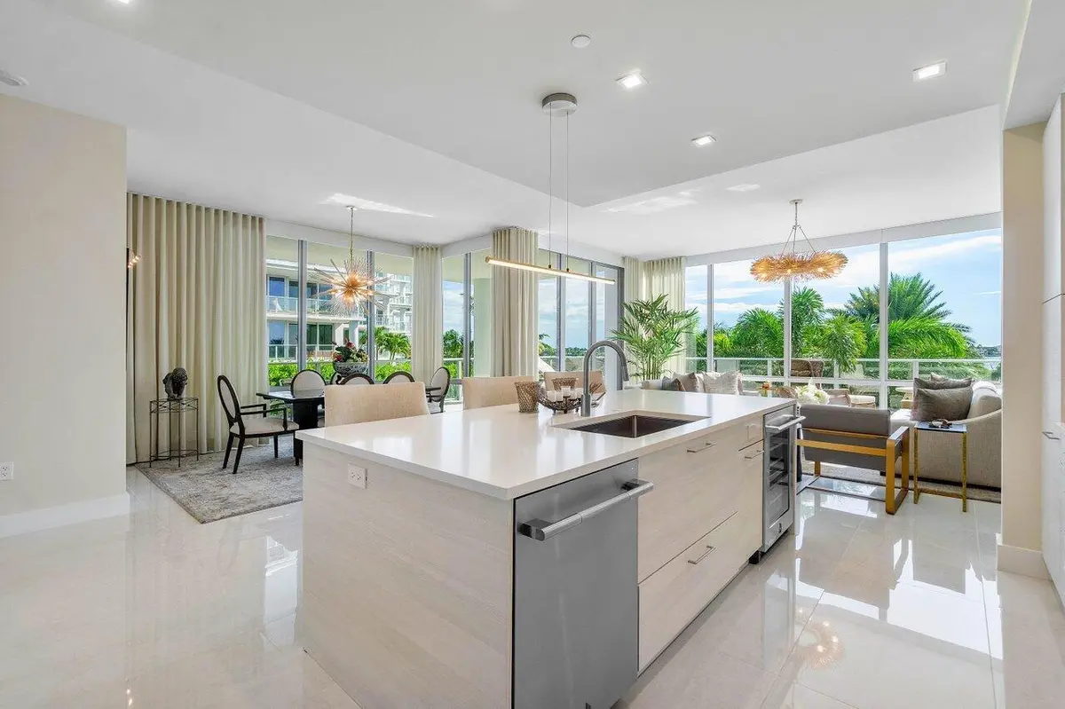 Living room dining room at 3 Water Club Way 401, North Palm Beach