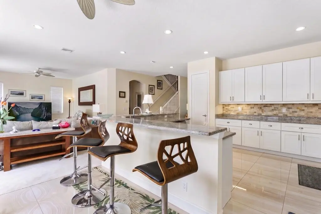 Kitchen+bar at 104 Kopsia Drive, Jupiter