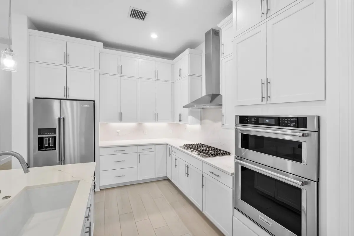chef's kitchen at 9303 Cape Honey Bee Lane, Lake Worth