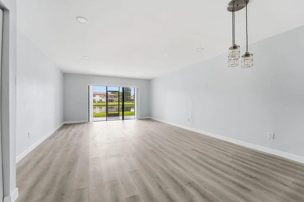 21839ArribaReal10GLivingroom at 21839 Arriba Real 10g, Boca Raton