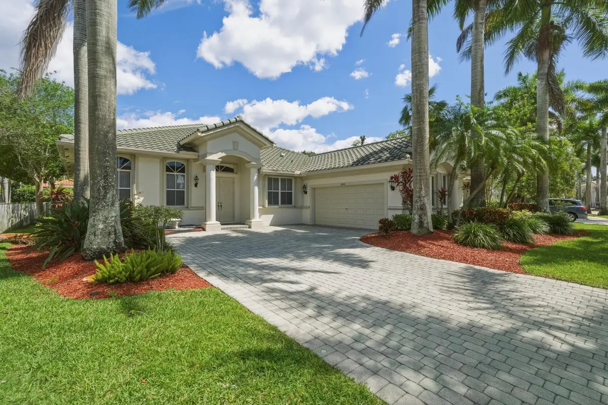 Long Driveway at 2053 Quail Roost Drive, Weston