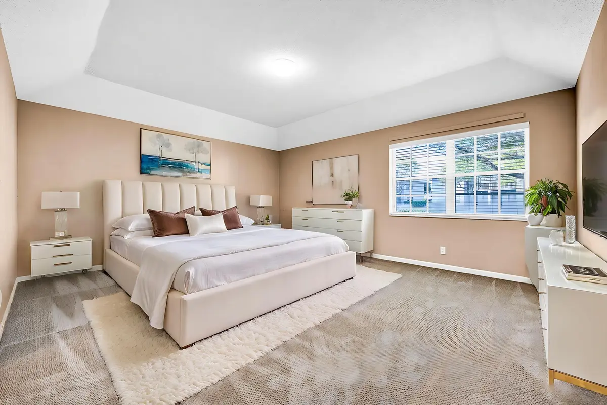 Virtually Staged Primary Bedroom at 11571 Briarwood Circle 1, Boynton Beach