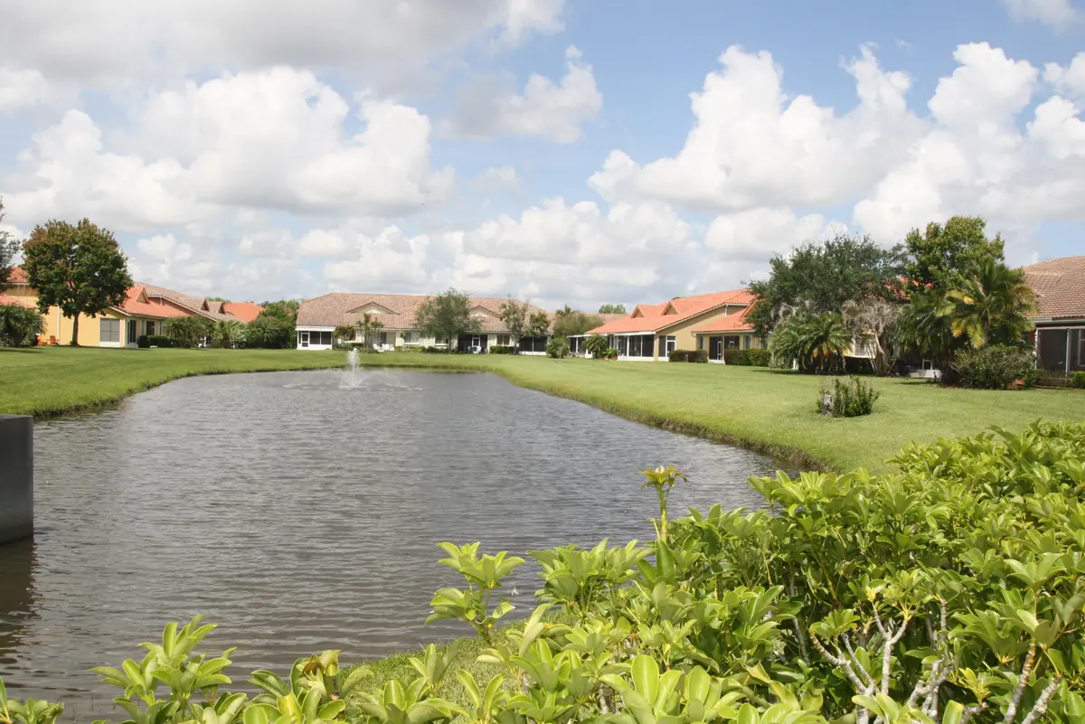 Long lake views towards the fountain at 6500 Oxford Circle 103, Vero Beach