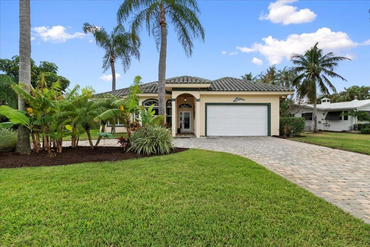 Front of home at 72 Waterway Road, Jupiter
