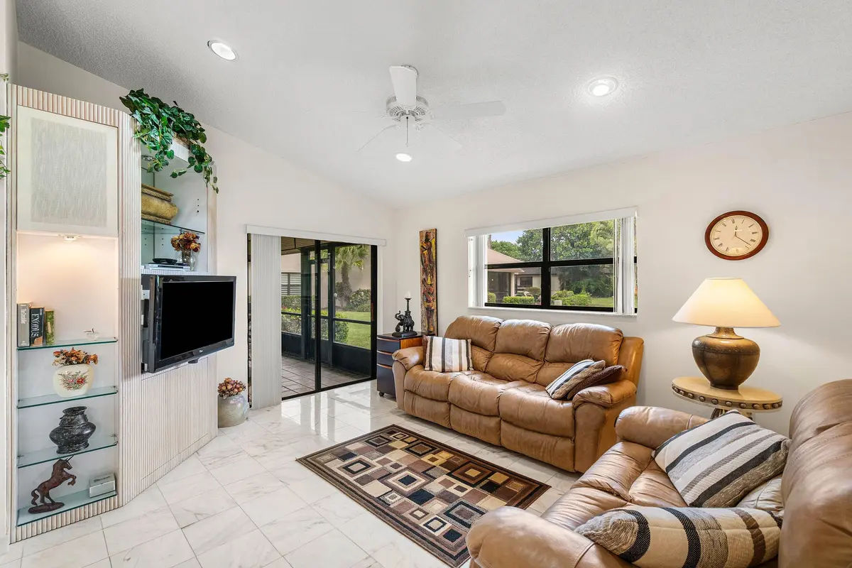 Great Storage in Family Room at 5692 Willow Creek Lane, Delray Beach