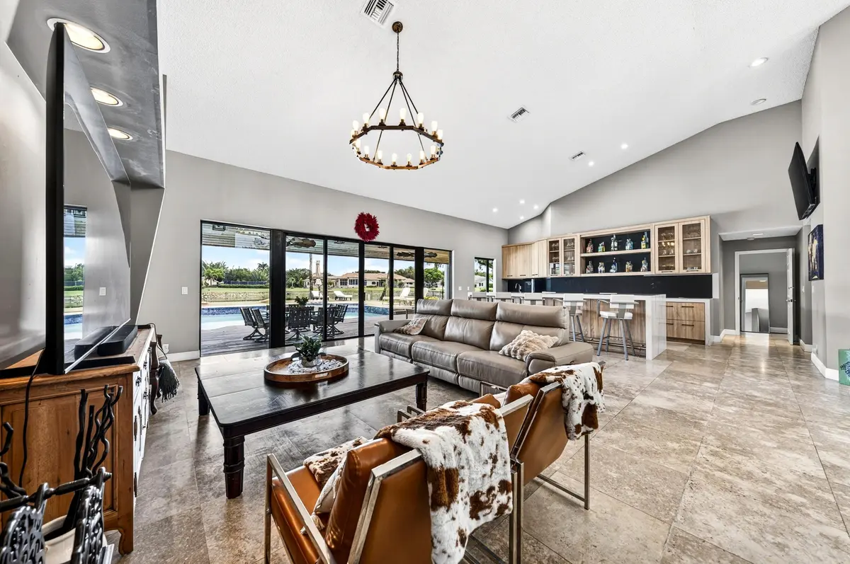 009-048-Living Room-4000x2658 at 7031 Ventura Court, Parkland