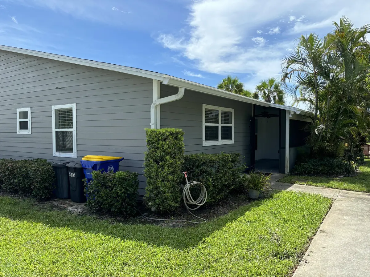 Front view at 9033 SE Hobe Ridge Avenue, Hobe Sound