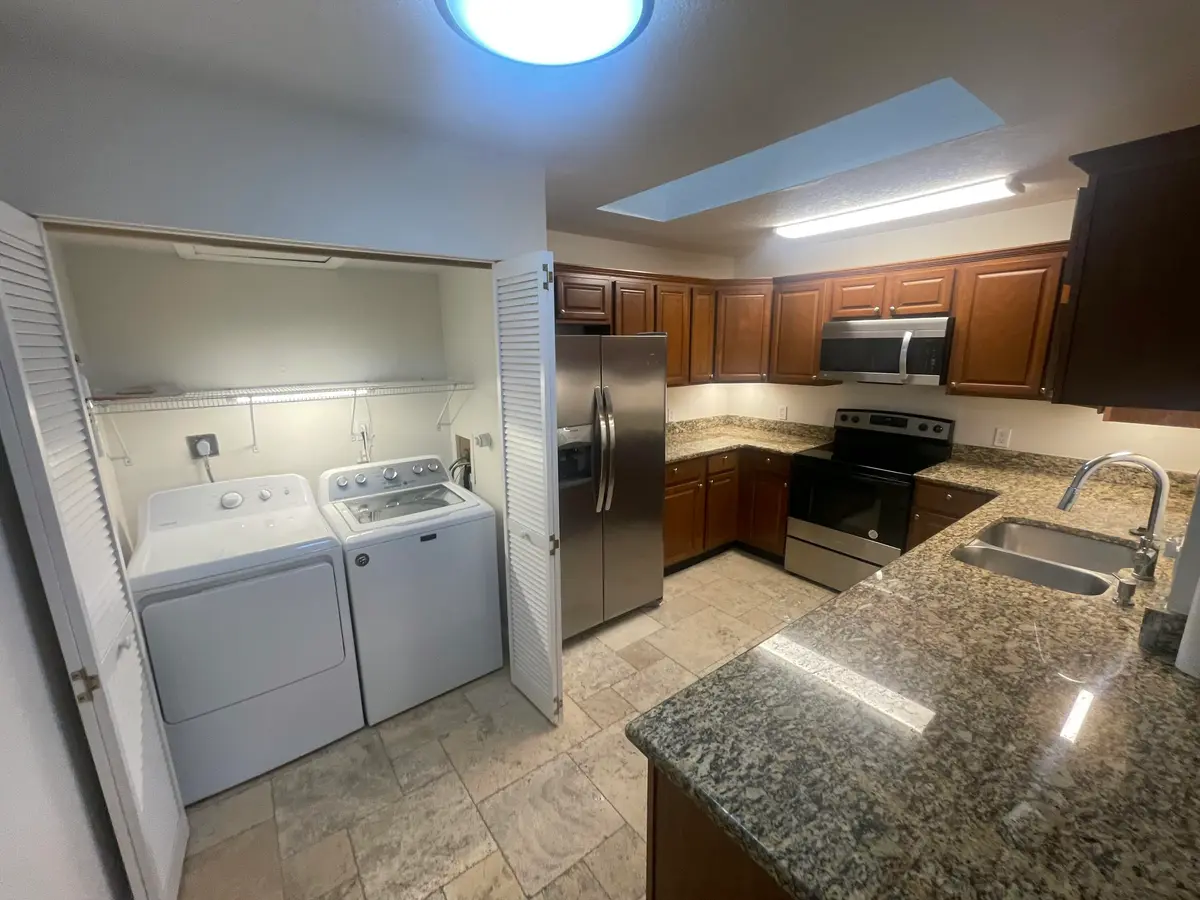 Kitchen and Laundry at 9033 SE Hobe Ridge Avenue, Hobe Sound