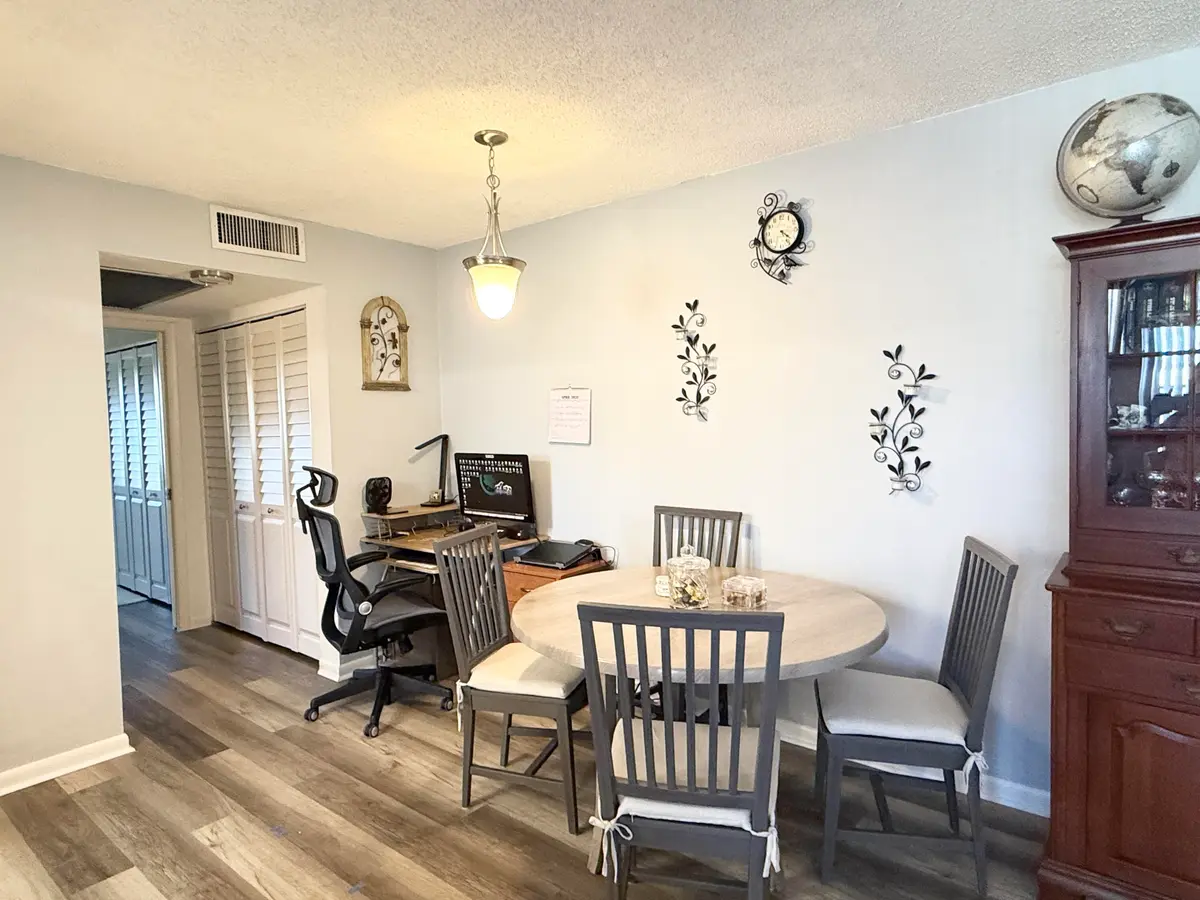 Dining area at 228 Canterbury J, West Palm Beach