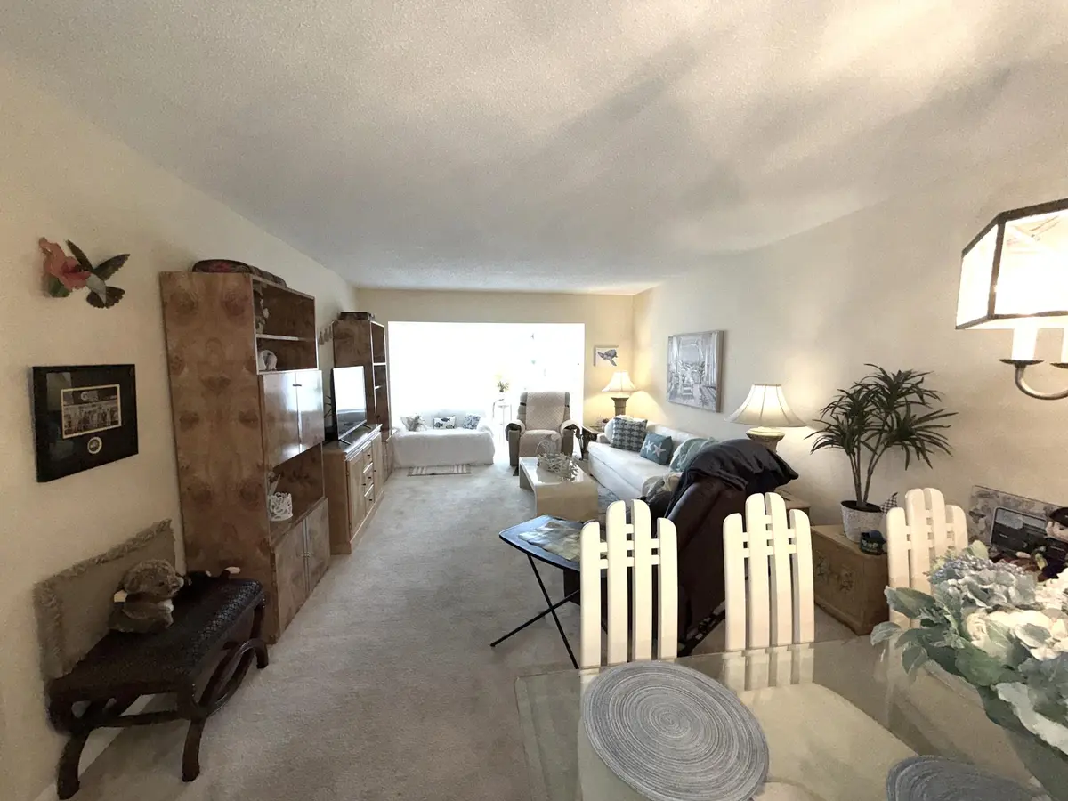 Dining area to living room at 1030 Silk Oak Terrace 101, Delray Beach