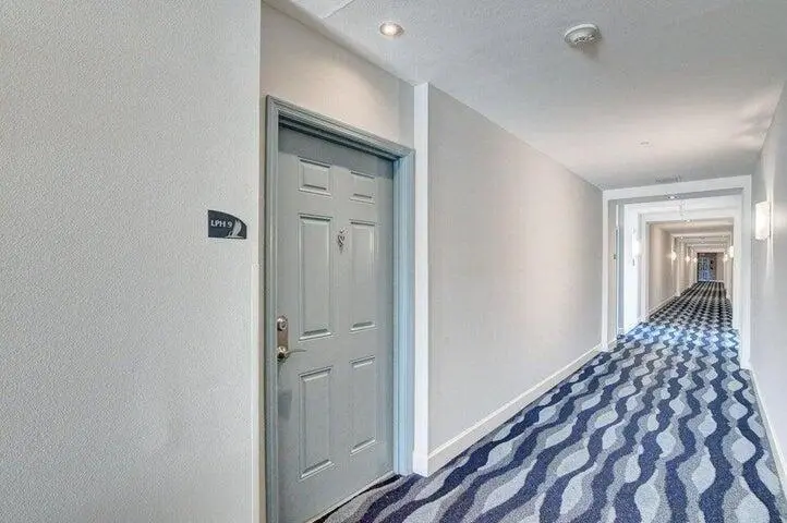 lower penthouse hall at 625 Casa Loma Boulevard Lower Penthouse 9 Unit 1509, Boynton Beach