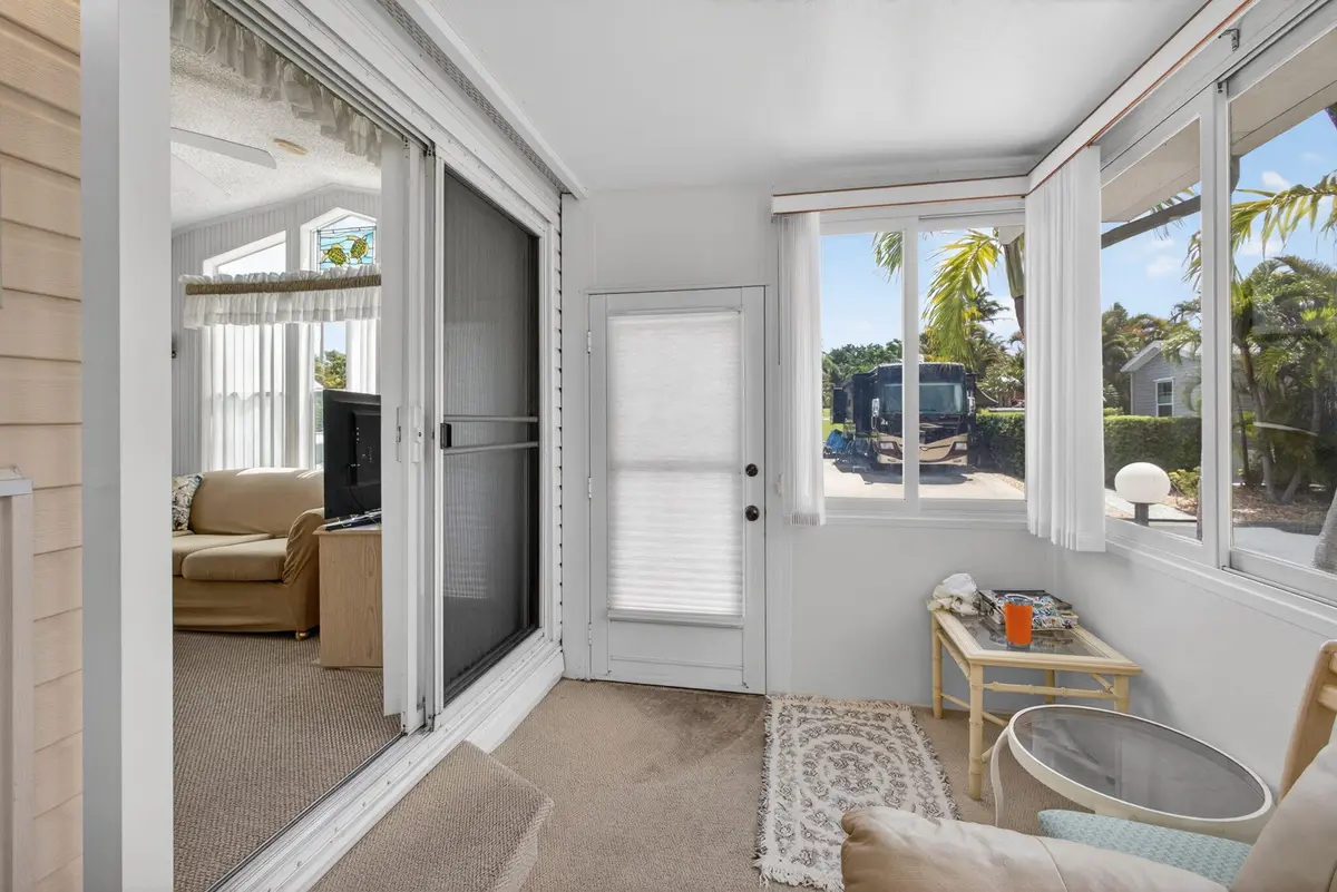 enter on enclosed porch. at 900 Juno Ocean Walk A71, Juno Beach