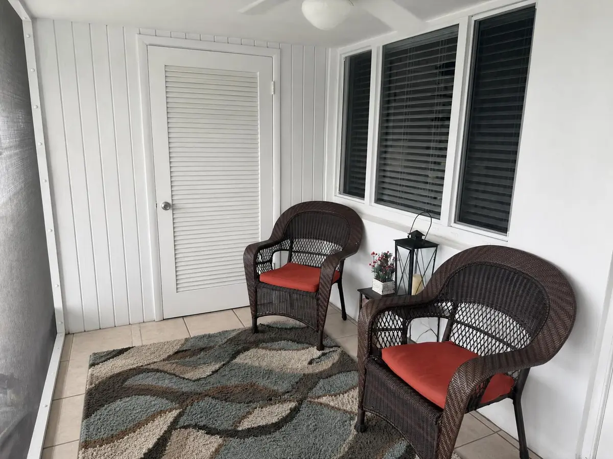 Screened porch over looking the water at 111 Shore Court 302, North Palm Beach