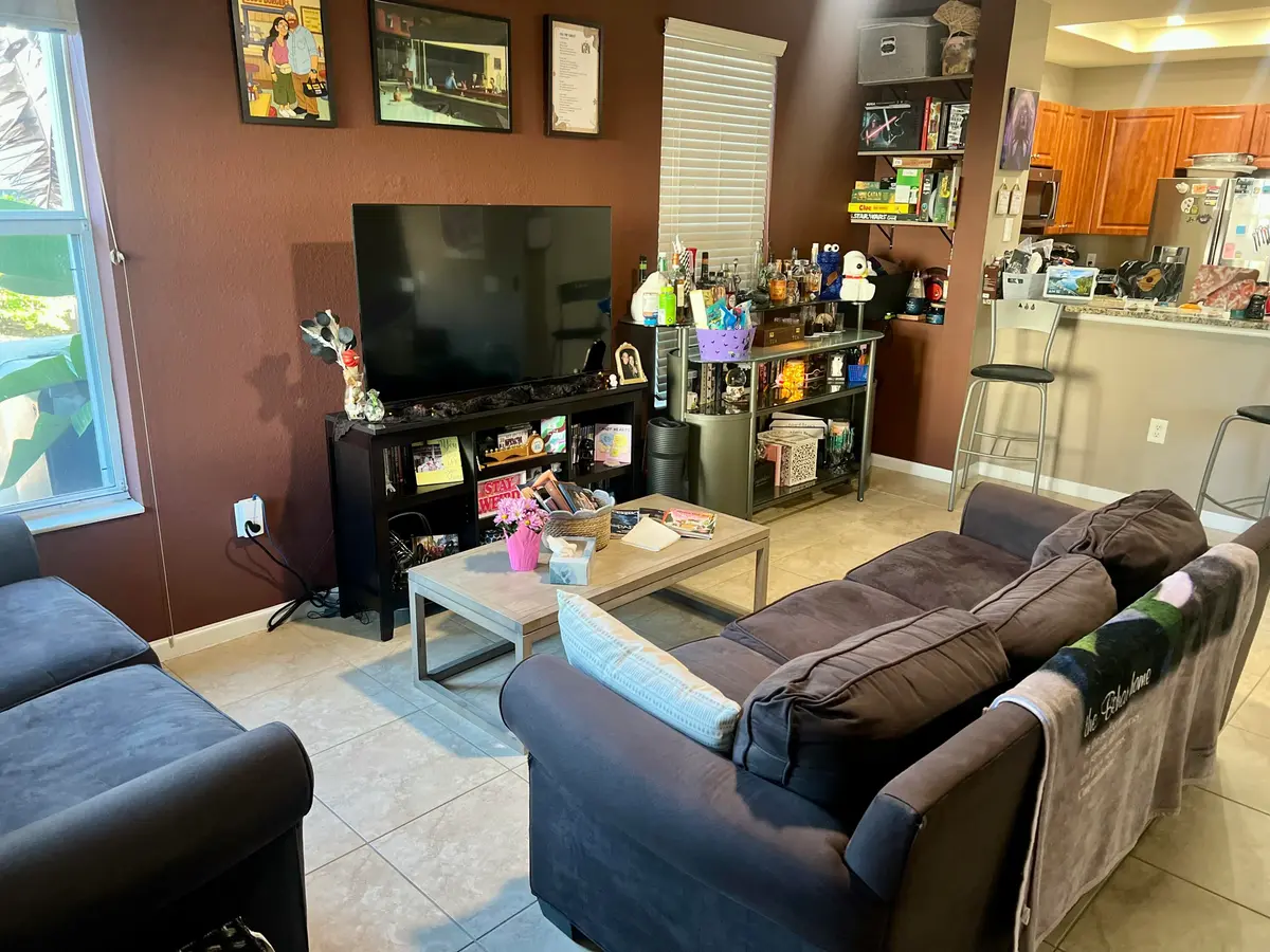 Family Room at 4501 Mimosa Terrace 1401, Coconut Creek