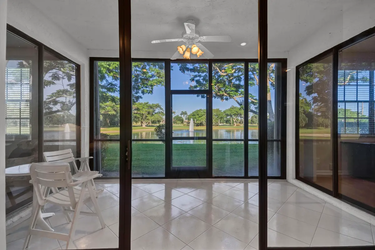 Enclosed Lanai with Lake View at 22791 Trelawny Terrace C, Boca Raton