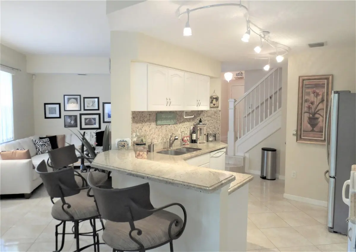 Kitchen & Living Room at 1900 Oceanwalk Lane 117, Lauderdale-By-The-Sea