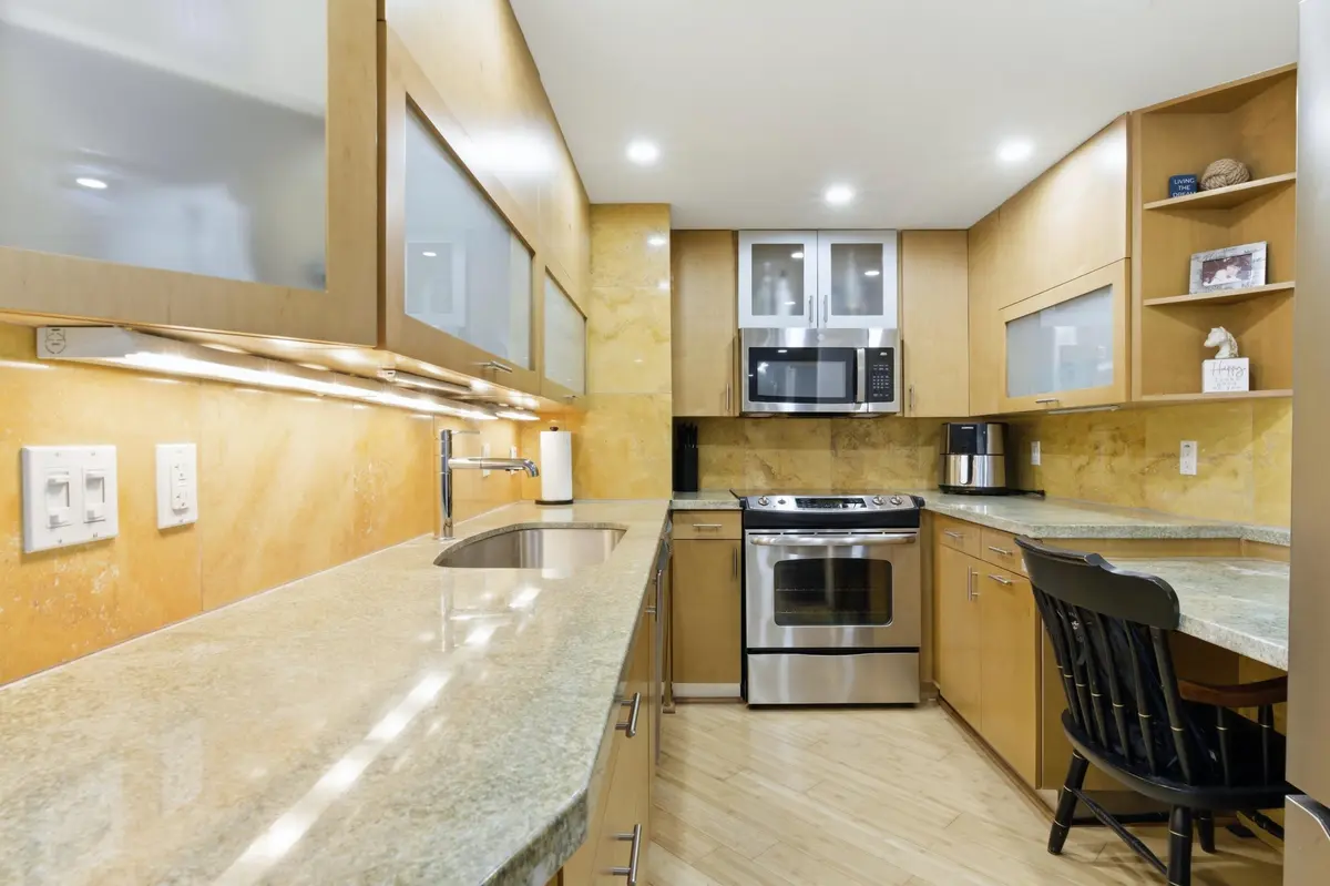 Stainless appliances & granite at 5600 N Flagler Drive Unit 910, West Palm Beach
