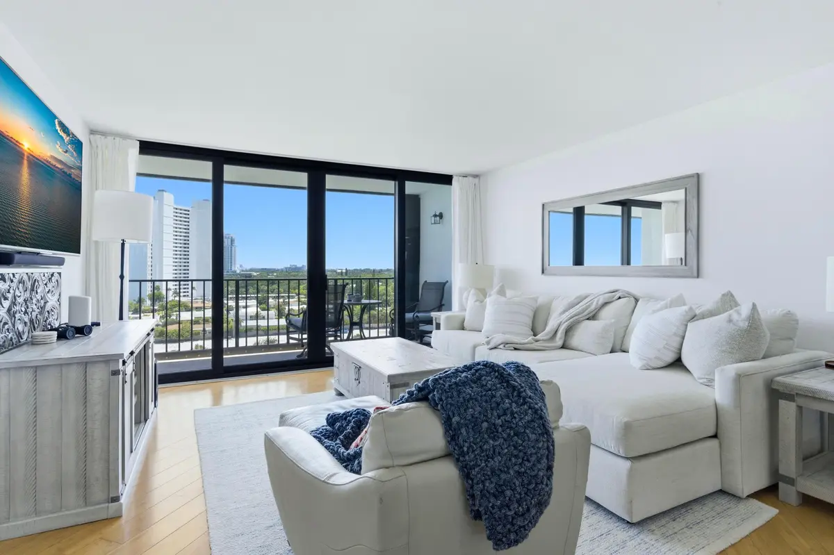 Family room overlooking balcony at 5600 N Flagler Drive Unit 910, West Palm Beach
