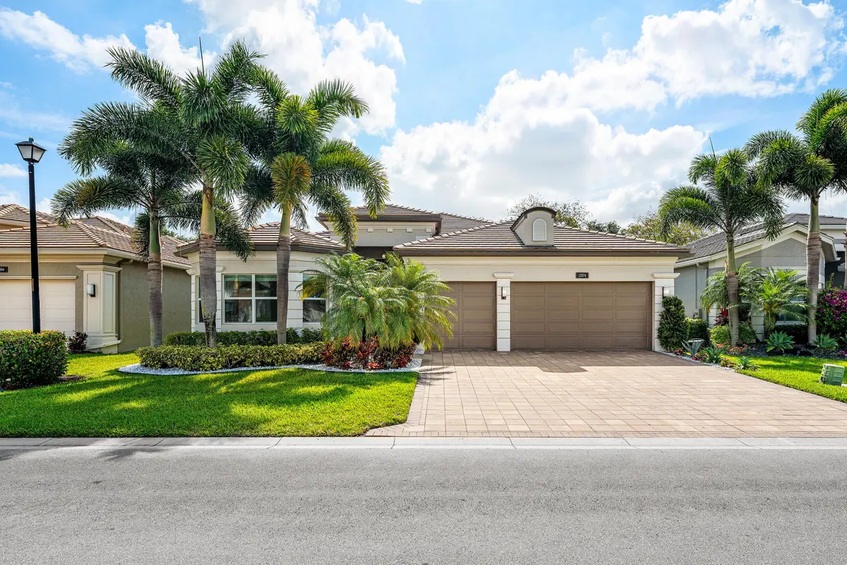 Lushly Landscaped Exerior at 12874 Granite Mountain Pass, Boynton Beach