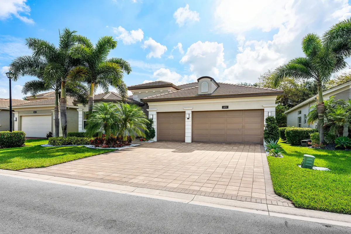 Lushly Landscaped Exerior at 12874 Granite Mountain Pass, Boynton Beach