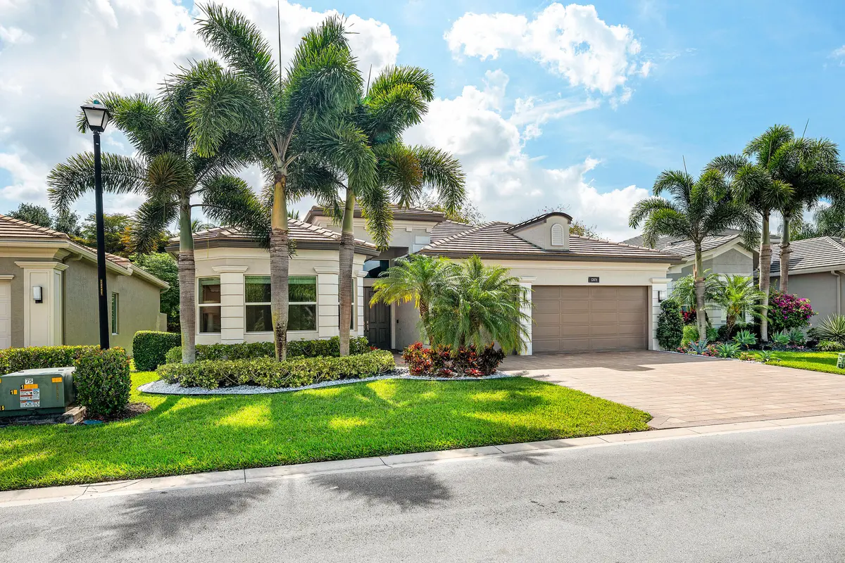 Lushly Landscaped Exerior at 12874 Granite Mountain Pass, Boynton Beach