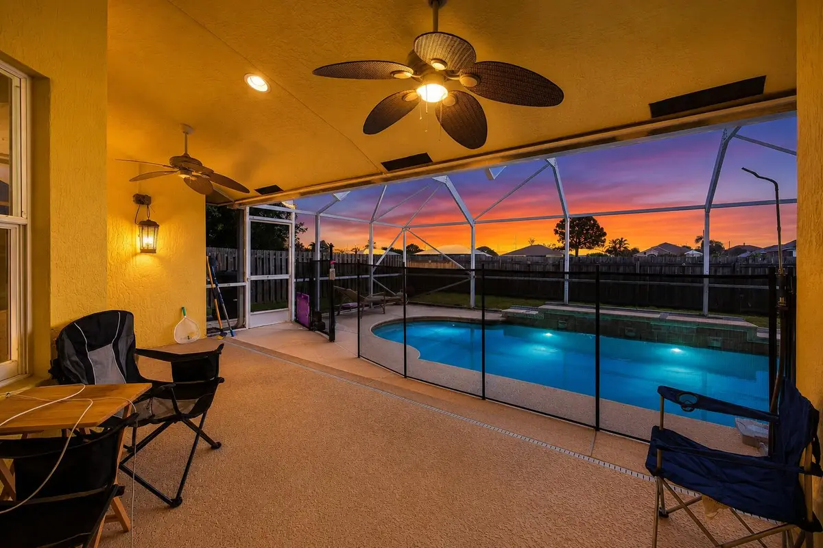 Pool View at night at 5785 NW Dublin Drive, Port St. Lucie