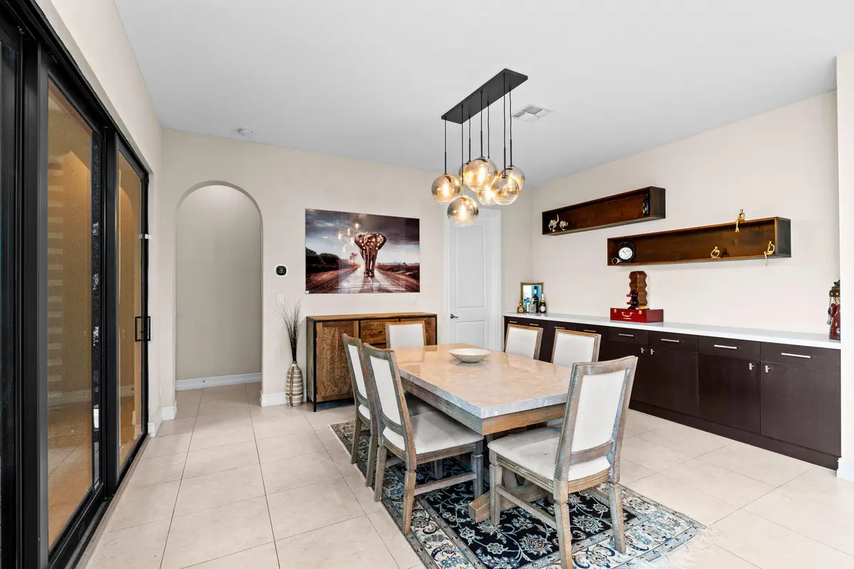 Dining Room at 8845 Watercrest Circle, Parkland