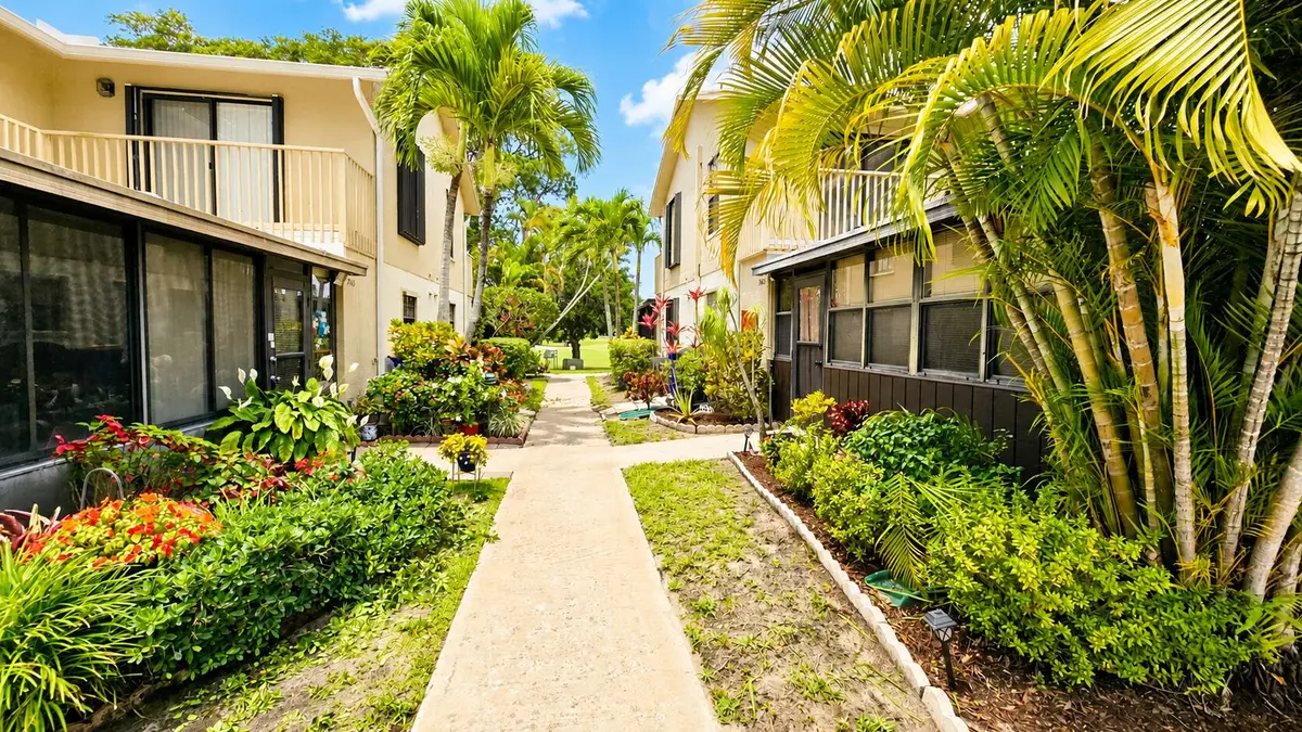 Sidewalk to front door at 7442 SE Jamestown Terrace, Hobe Sound