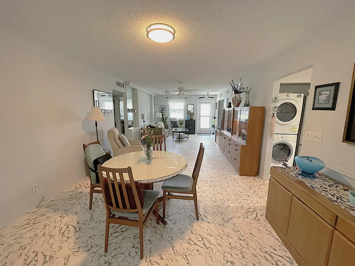 Dining Area to Living Room at 2431 Del Aire Boulevard 115-d, Delray Beach