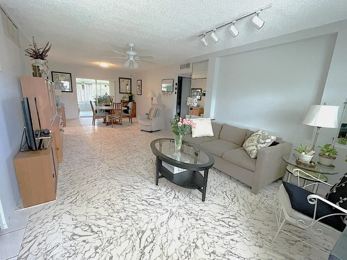 Living Room to Florida Room at 2431 Del Aire Boulevard 115-d, Delray Beach