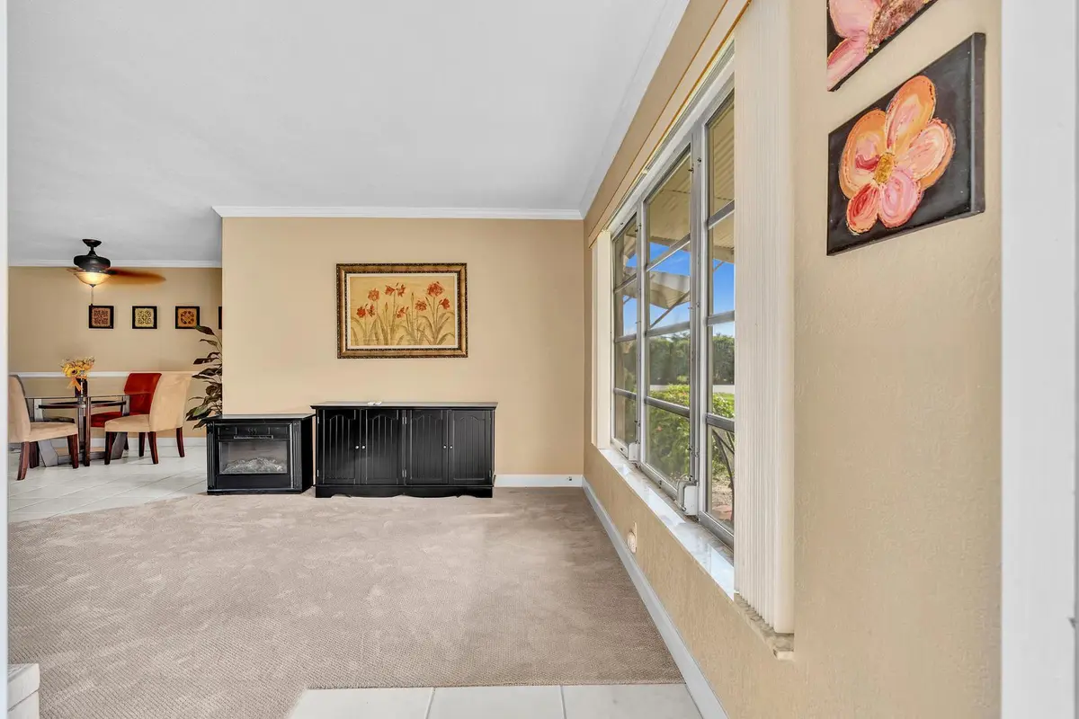Living Area from front door at 840 N High Point Blvd Boulevard B, Delray Beach