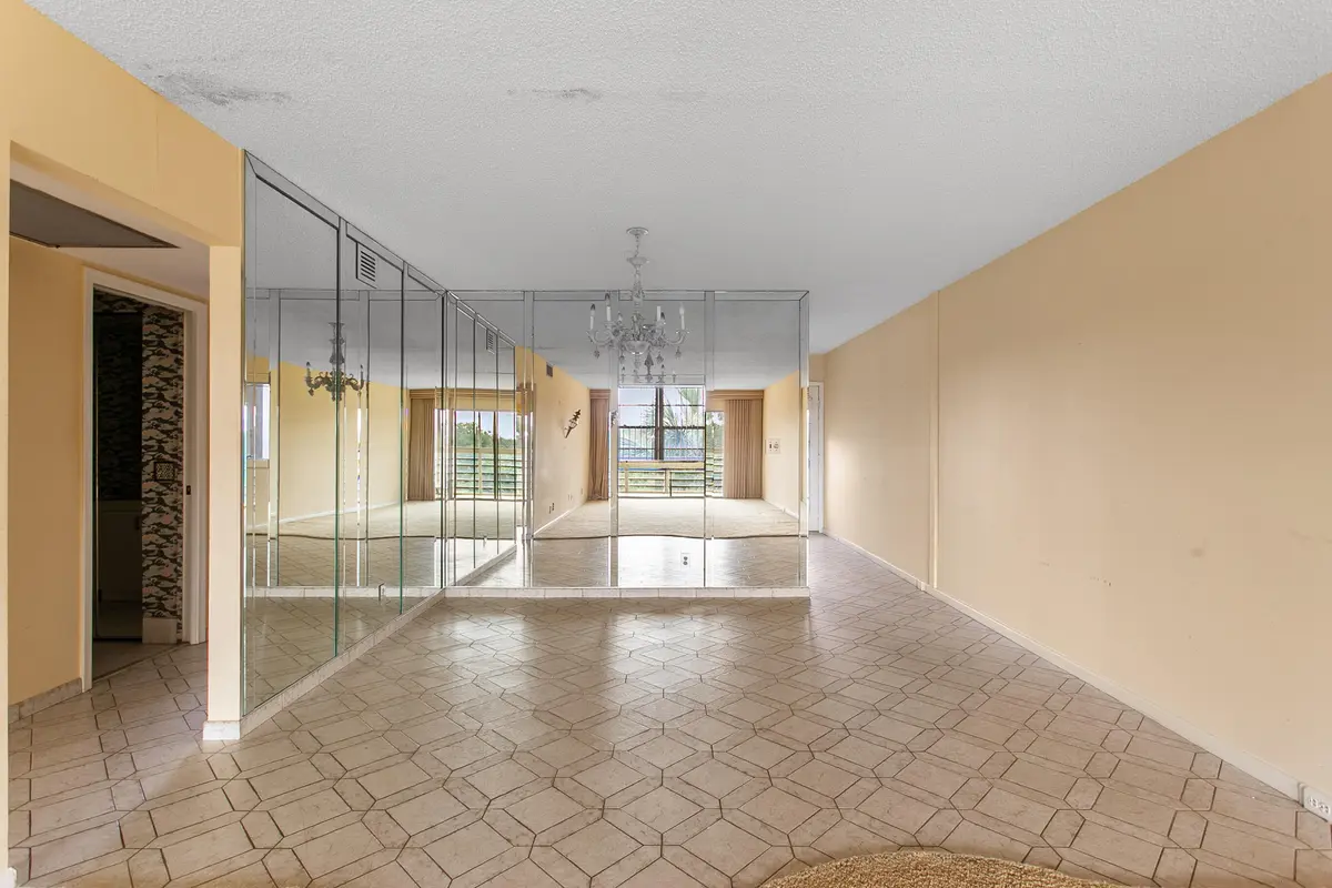 Dining Area Mirrors at 2502 Antigua Terrace F4, Coconut Creek