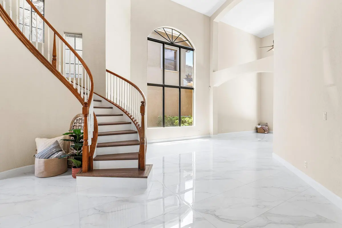 Winding Staircase at 10293 Medicis Place, Wellington