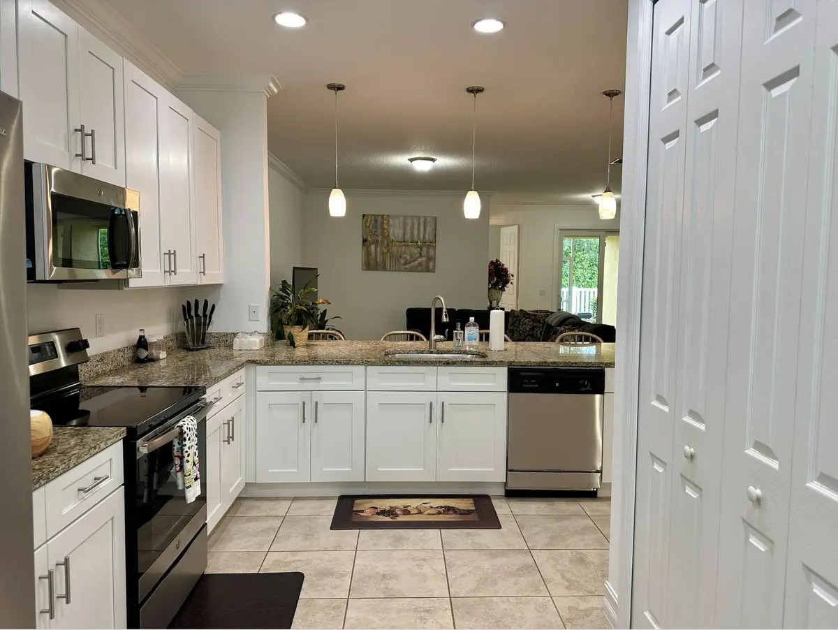 6112 Cullen Kitchen to Living at 6112 NW Cullen Way, Port St. Lucie