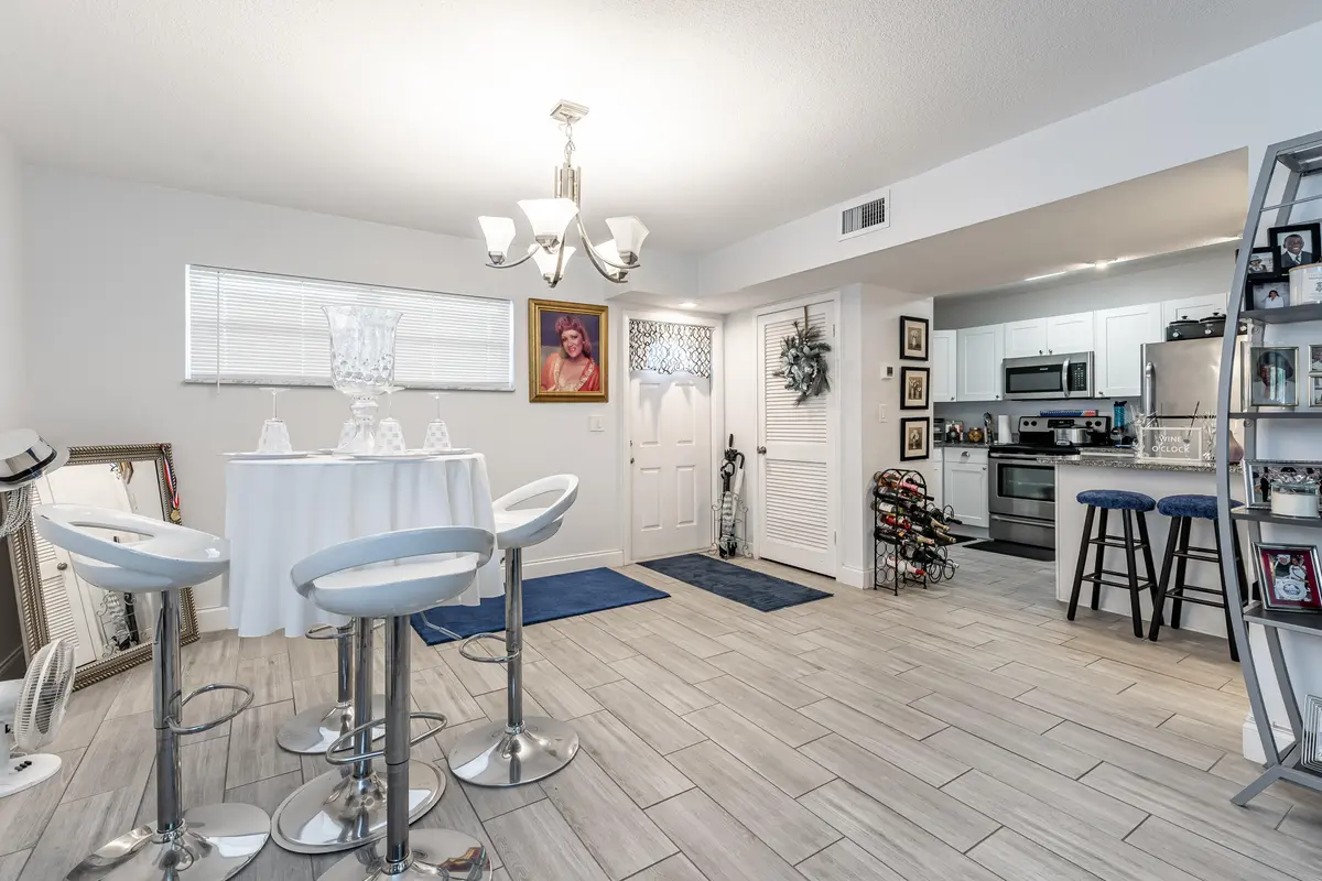 1. Dining Room Kitchen Foyer Nice at 8911 S Hollybrook Boulevard 306, Pembroke Pines