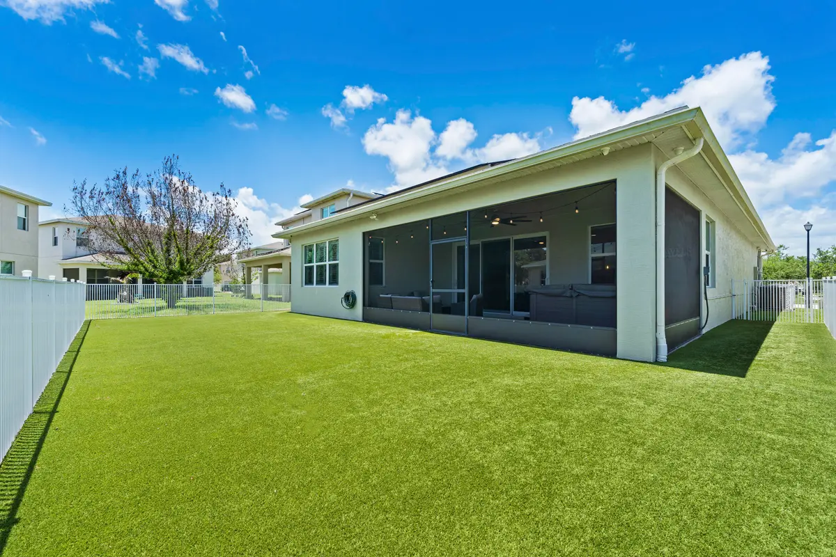 FENCED BACKYARD ARTIFICIAL TURF at 1600 NW Vivanco Street, Port St. Lucie