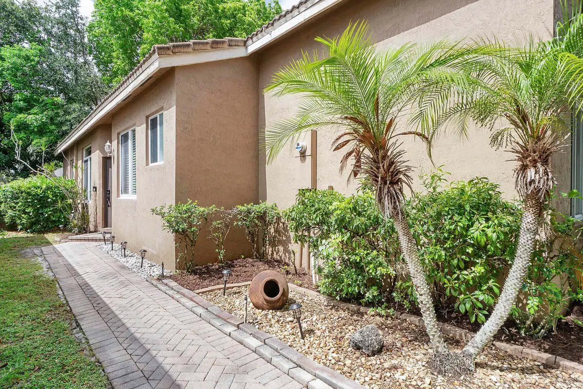 Path to entry at 5024 Ibis Court, Coconut Creek