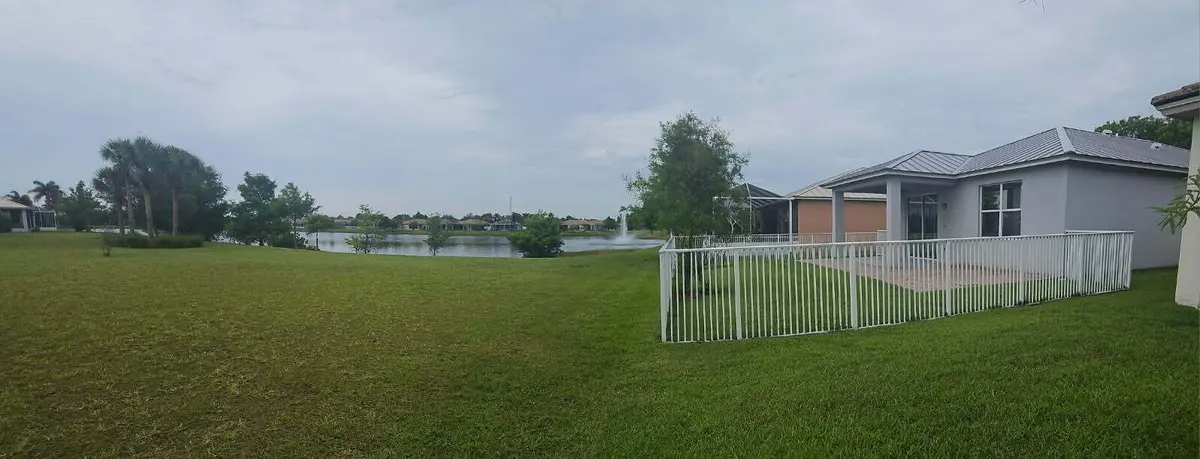 BACKYARD VIEW OF LAKE AND LOT! at 9872 SW Glenbrook Drive, Port St. Lucie