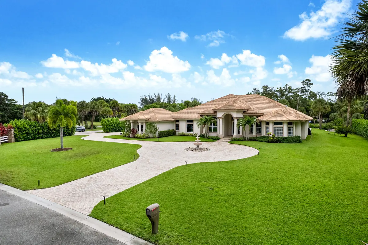 Front aerial at 142 Brynhurst Court, West Palm Beach