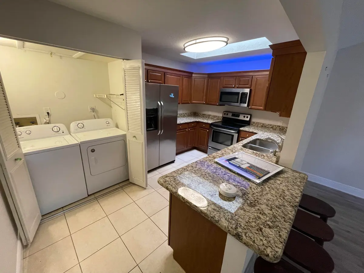 9073 Hobe Ridge kitchen laundry at 9073 SE Hobe Ridge Avenue, Hobe Sound