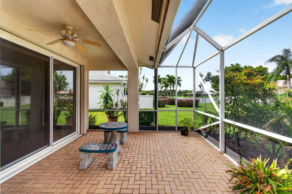 Extended Enclosed Patio w Lake View at 2752 Clipper Circle, West Palm Beach