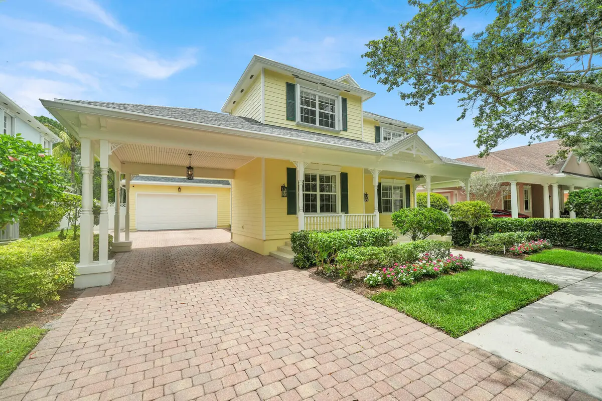 front to garage 221 at 221 Marlberry Circle, Jupiter