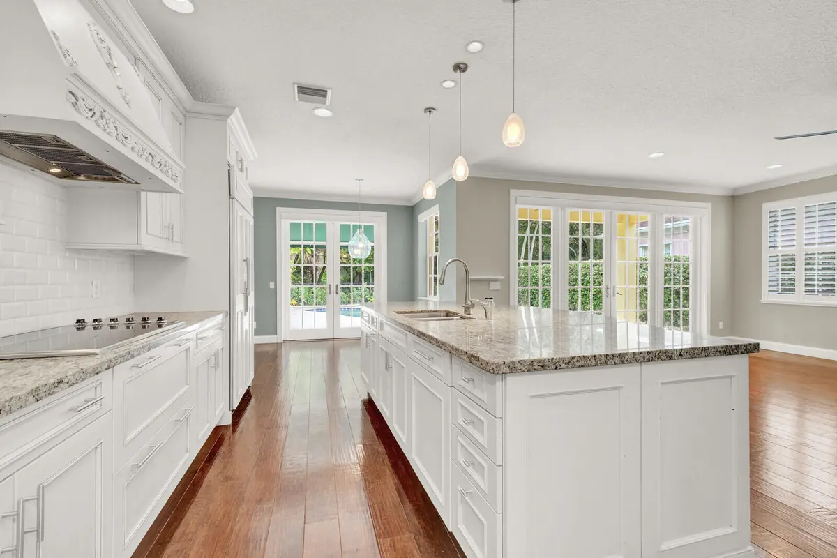 kitchen to nook and pool 221 at 221 Marlberry Circle, Jupiter