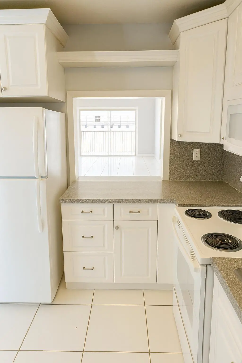 Modern Kitchen with Living Area View at 1001 SE 3rd Street 3, Deerfield Beach