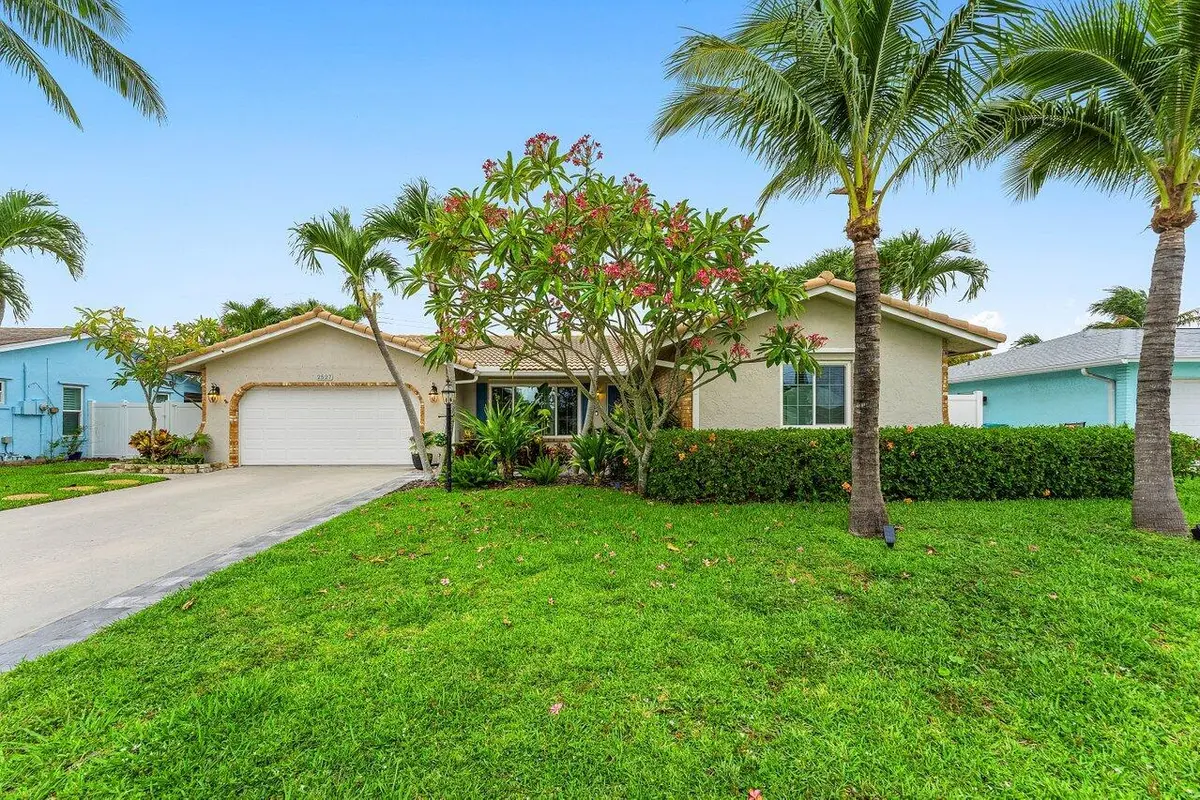 Front with 2 car garage at 2527 SW 12th Street, Boynton Beach