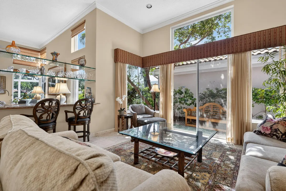 LIVING ROOM AND TNERTAINMENT AREA at 402 Eagleton Cove Way, Palm Beach Gardens
