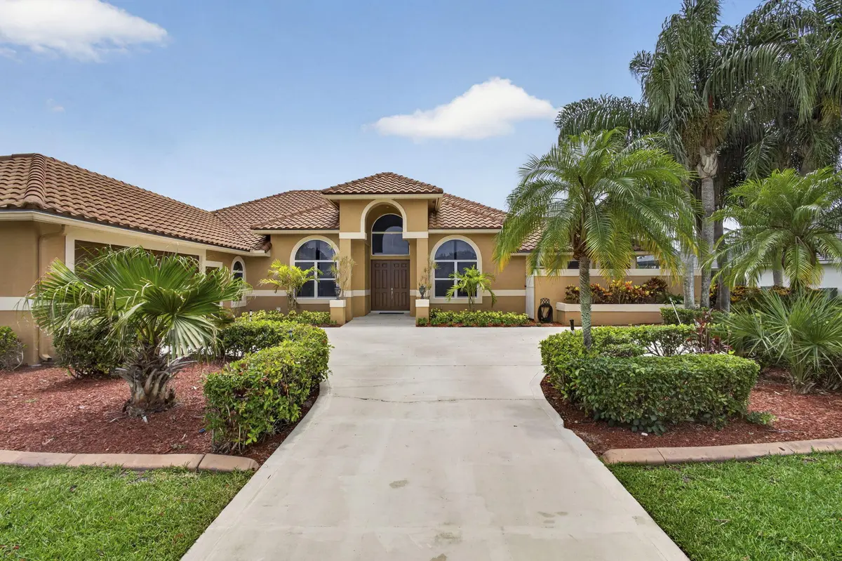 Front of House at 8030 Woodsmuir Drive, Palm Beach Gardens